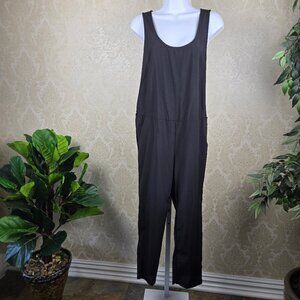 Peach Royal Size Small Black Jumpsuit Open Sides Open Back Keyhole Tapered Leg